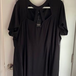 NWT Torrid Cage neck Peplum style top size 4